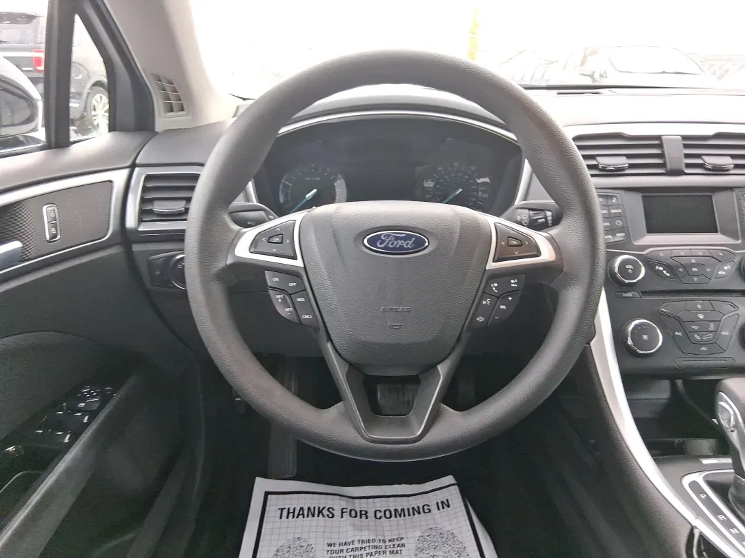 2014 Ford Fusion SE (1FA6P0H77E5) with an 2.5L L4 DOHC 16V engine, Automatic transmission, located at 880 E. National Road, Vandalia, OH, 45377, (937) 908-9800, 39.891918, -84.183594 - Need a dependable sedan for the daily commute up I75, school drop-offs around Vandalia-Butler City Schools, and comfortable weekend drives to the National Museum of the U.S. Air Force? This 2014 Ford Fusion SE is built for real life-smooth on longer stretches of E. National Road, easy to park for er - Photo#17