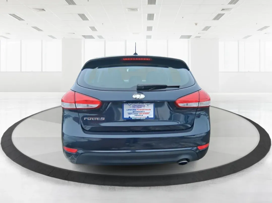 2018 Kia Forte LX (KNAFK5A89J5) with an 2L I-4 DOHC engine, 6A transmission, located at 1951 S Dayton Lakeview Rd., New Carlisle, OH, 45344, (937) 908-9800, 39.890999, -84.050255 - Need a smart, budget-friendly ride that can handle daily commutes to Dayton, quick grocery runs, and spontaneous weekend trips without feeling cramped? This 2018 Kia Forte LX Hatchback in Gravity Blue is built for real-life driving in and around New Carlisle-easy to park, efficient to live with, and - Photo#3