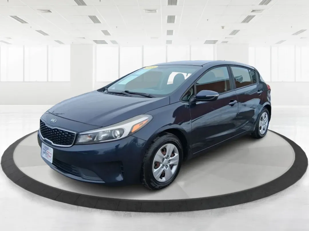 2018 Kia Forte LX (KNAFK5A89J5) with an 2L I-4 DOHC engine, 6A transmission, located at 1951 S Dayton Lakeview Rd., New Carlisle, OH, 45344, (937) 908-9800, 39.890999, -84.050255 - Need a smart, budget-friendly ride that can handle daily commutes to Dayton, quick grocery runs, and spontaneous weekend trips without feeling cramped? This 2018 Kia Forte LX Hatchback in Gravity Blue is built for real-life driving in and around New Carlisle-easy to park, efficient to live with, and - Photo#8