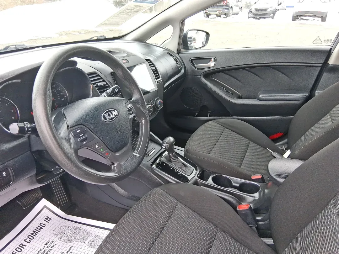 2018 Kia Forte LX (KNAFK5A89J5) with an 2L I-4 DOHC engine, 6A transmission, located at 1951 S Dayton Lakeview Rd., New Carlisle, OH, 45344, (937) 908-9800, 39.890999, -84.050255 - Need a smart, budget-friendly ride that can handle daily commutes to Dayton, quick grocery runs, and spontaneous weekend trips without feeling cramped? This 2018 Kia Forte LX Hatchback in Gravity Blue is built for real-life driving in and around New Carlisle-easy to park, efficient to live with, and - Photo#9