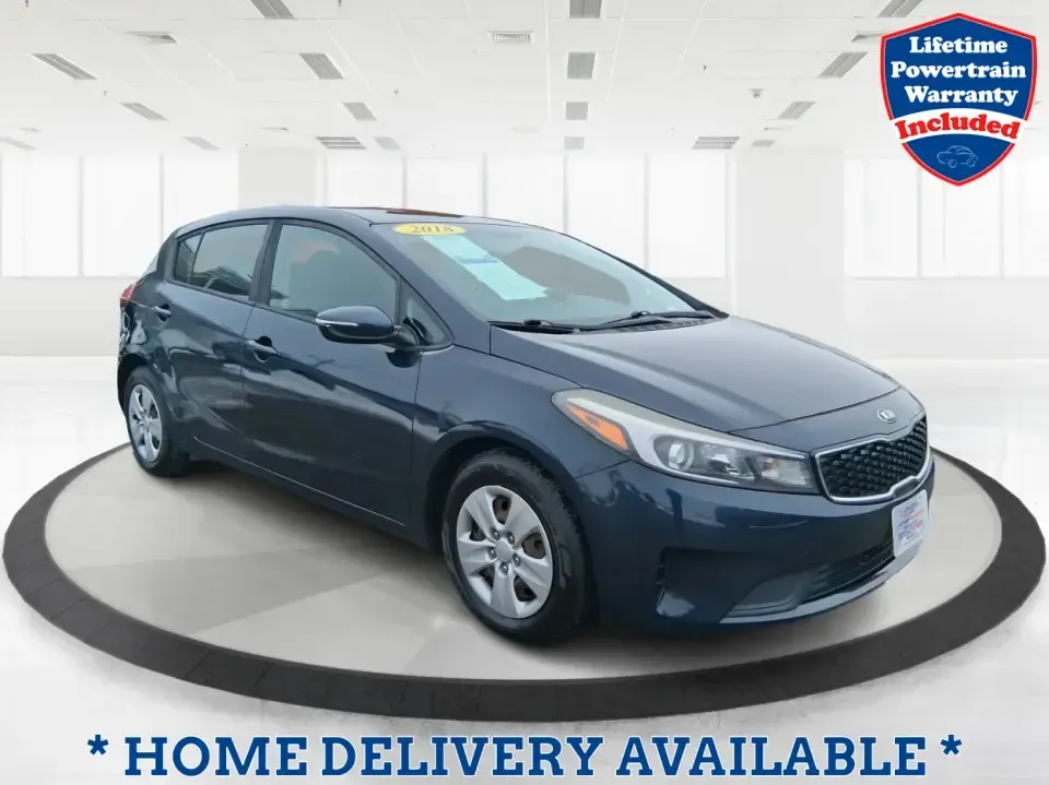 2018 Kia Forte LX (KNAFK5A89J5) with an 2L I-4 DOHC engine, 6A transmission, located at 1951 S Dayton Lakeview Rd., New Carlisle, OH, 45344, (937) 908-9800, 39.890999, -84.050255 - Need a smart, budget-friendly ride that can handle daily commutes to Dayton, quick grocery runs, and spontaneous weekend trips without feeling cramped? This 2018 Kia Forte LX Hatchback in Gravity Blue is built for real-life driving in and around New Carlisle-easy to park, efficient to live with, and - Photo#0