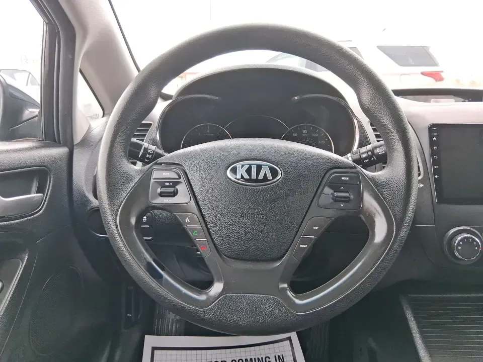 2018 Kia Forte 5-Door LX (KNAFK5A89J5) with an 2.0L L4 DOHC 16V engine, 6A transmission, located at 4508 South Dixie Dr, Moraine, OH, 45439, (937) 908-9800, 39.689976, -84.218452 - Need a smart daily driver that can handle the Monday commute down South Dixie Drive, quick grocery runs near Dayton Mall, and spontaneous weekend getaways without draining your budget? This 2018 Kia Forte 5Door LX hatchback fits real life in Moraine-easy to park, roomy for friends or family, and eff- Photo#16