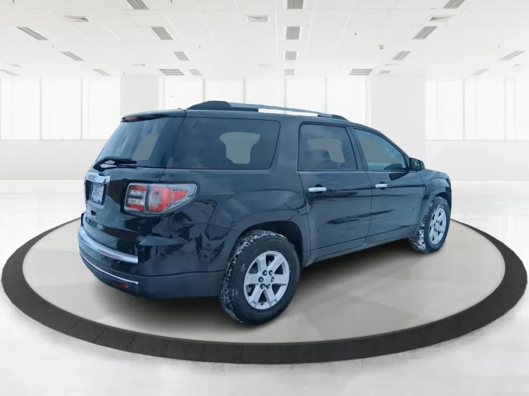 2014 GMC Acadia SLE-2 (1GKKRPKD7EJ) with an 3.6L V-6 gasoline direct injection engine, located at 8750 N County Rd 25A, Piqua, OH, 45356, (937) 908-9800, 40.164391, -84.232513 - Life gets busy-school drop-offs, long commutes, weekend tournaments, and the occasional road trip up I75. If you need one SUV that can handle family life and still feel comfortable on the daily drive, this **2014 GMC Acadia SLE-2** is a smart, versatile choice. Finished in **Carbon Black Metallic** - Photo#2