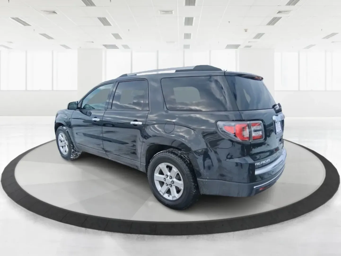 2014 GMC Acadia SLE-2 (1GKKRPKD7EJ) with an 3.6L V-6 gasoline direct injection engine, 6-Speed Automatic transmission, located at 8750 N County Rd 25A, Piqua, OH, 45356, (937) 908-9800, 40.164391, -84.232513 - Life gets busy-school drop-offs, long commutes, weekend tournaments, and the occasional road trip up I75. If you need one SUV that can handle family life and still feel comfortable on the daily drive, this **2014 GMC Acadia SLE-2** is a smart, versatile choice. Finished in **Carbon Black Metallic** - Photo#3