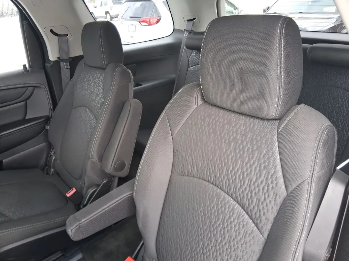 2014 GMC Acadia SLE-2 (1GKKRPKD7EJ) with an 3.6L V-6 gasoline direct injection engine, 6-Speed Automatic transmission, located at 8750 N County Rd 25A, Piqua, OH, 45356, (937) 908-9800, 40.164391, -84.232513 - Life gets busy-school drop-offs, long commutes, weekend tournaments, and the occasional road trip up I75. If you need one SUV that can handle family life and still feel comfortable on the daily drive, this **2014 GMC Acadia SLE-2** is a smart, versatile choice. Finished in **Carbon Black Metallic** - Photo#9