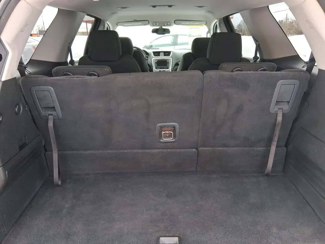 2014 GMC Acadia SLE-2 (1GKKRPKD7EJ) with an 3.6L V-6 gasoline direct injection engine, located at 8750 N County Rd 25A, Piqua, OH, 45356, (937) 908-9800, 40.164391, -84.232513 - Life gets busy-school drop-offs, long commutes, weekend tournaments, and the occasional road trip up I75. If you need one SUV that can handle family life and still feel comfortable on the daily drive, this **2014 GMC Acadia SLE-2** is a smart, versatile choice. Finished in **Carbon Black Metallic** - Photo#11