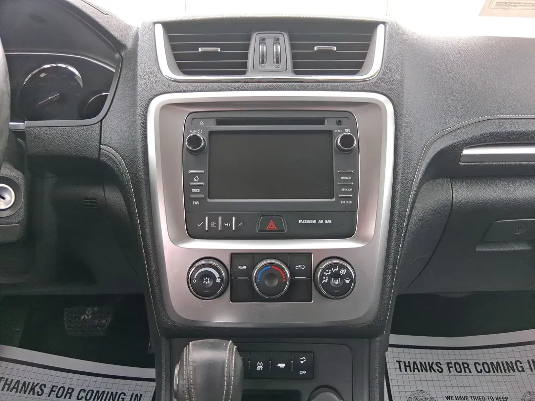 2014 GMC Acadia SLE-2 (1GKKRPKD7EJ) with an 3.6L V-6 gasoline direct injection engine, located at 8750 N County Rd 25A, Piqua, OH, 45356, (937) 908-9800, 40.164391, -84.232513 - Life gets busy-school drop-offs, long commutes, weekend tournaments, and the occasional road trip up I75. If you need one SUV that can handle family life and still feel comfortable on the daily drive, this **2014 GMC Acadia SLE-2** is a smart, versatile choice. Finished in **Carbon Black Metallic** - Photo#12