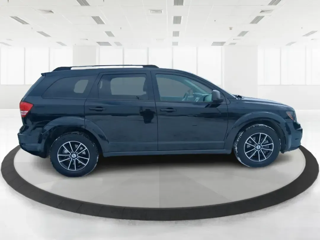 2018 Dodge Journey SE (3C4PDCAB9JT) with an Tigershark MultiAir 2.4L I-4 DOHC engine, 4A transmission, located at 880 E. National Road, Vandalia, OH, 45377, (937) 908-9800, 39.891918, -84.183594 - Need a practical SUV that can handle school drop-offs, grocery runs, and weekend trips up I75 without blowing your budget? This 2018 Dodge Journey SE in Pitch Black Clearcoat is built for real life in West Central Ohio-roomy enough for growing families, comfortable for long commutes, and flexible fo - Photo#1