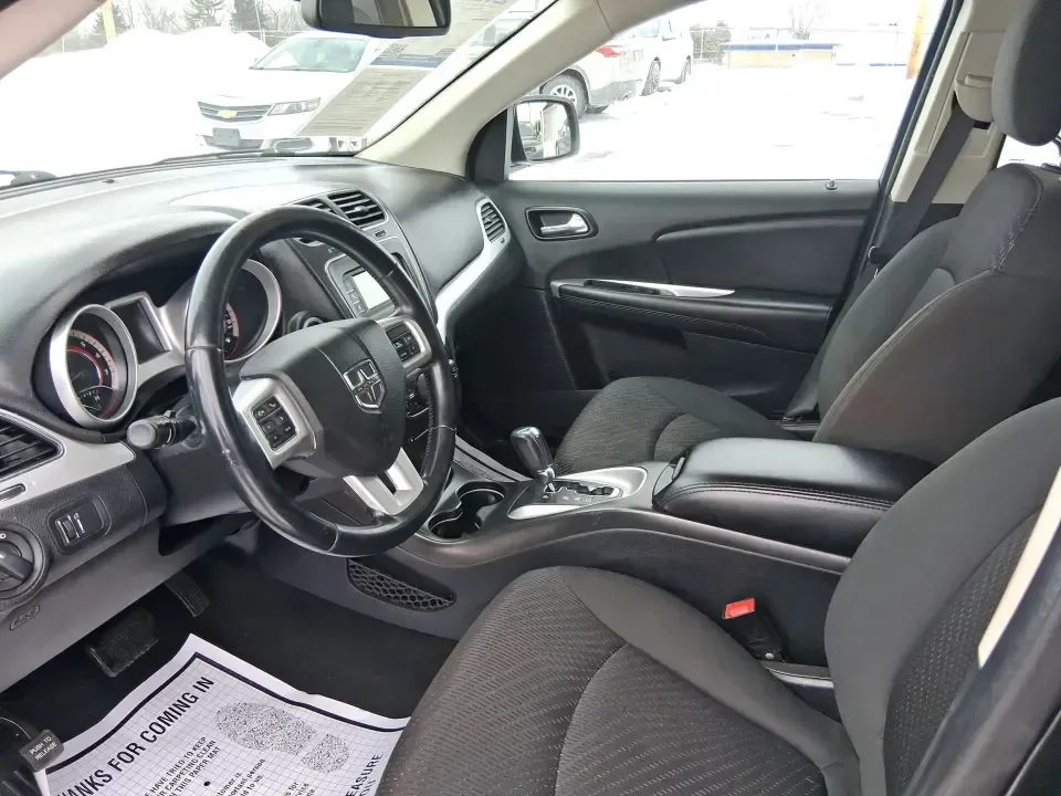 2018 Dodge Journey SE (3C4PDCAB9JT) with an Tigershark MultiAir 2.4L I-4 DOHC engine, 4A transmission, located at 880 E. National Road, Vandalia, OH, 45377, (937) 908-9800, 39.891918, -84.183594 - Need a practical SUV that can handle school drop-offs, grocery runs, and weekend trips up I75 without blowing your budget? This 2018 Dodge Journey SE in Pitch Black Clearcoat is built for real life in West Central Ohio-roomy enough for growing families, comfortable for long commutes, and flexible fo - Photo#8