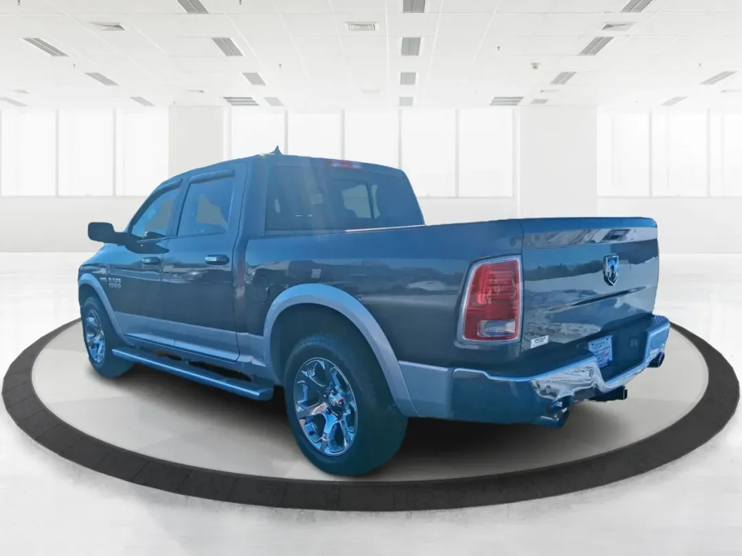 2016 Ram 1500 Laramie (1C6RR7NT1GS) with an 5.7L V8 OHV 16V engine, 6A transmission, located at 1099 N County Rd 25A , Troy, OH, 45373, (937) 908-9800, 40.057079, -84.212883 - Built for Ohio backroads, weekend lake runs, and the kind of workday that doesn't stop when the weather turns, this 2016 Ram 1500 Laramie Crew Cab 4WD is the truck that fits real life in Troy. Whether you're towing a trailer out toward the Miami County Fairgrounds, hauling gear for a Saturday at Tre - Photo#4