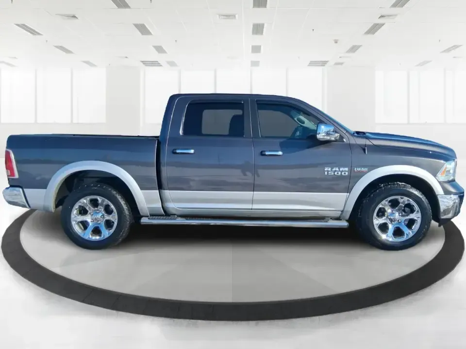 2016 Ram 1500 Laramie (1C6RR7NT1GS) with an 5.7L V8 OHV 16V engine, 6A transmission, located at 1230 East Main St, Xenia, OH, 45385, (937) 908-9800, 39.688026, -83.910172 - Built for Ohio backroads, weekend lake runs, and the kind of workday that doesn't stop when the weather turns, this 2016 Ram 1500 Laramie Crew Cab 4WD is the truck that fits real life in Troy. Whether you're towing a trailer out toward the Miami County Fairgrounds, hauling gear for a Saturday at Tre - Photo#1