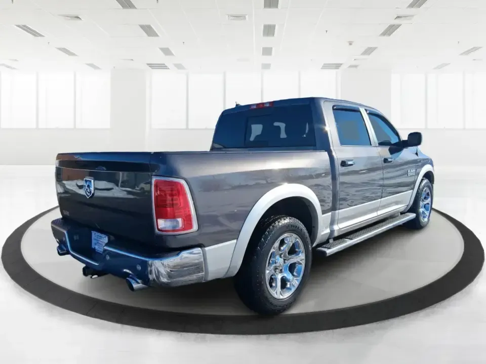 2016 Ram 1500 Laramie (1C6RR7NT1GS) with an 5.7L V8 OHV 16V engine, 6A transmission, located at 1230 East Main St, Xenia, OH, 45385, (937) 908-9800, 39.688026, -83.910172 - Built for Ohio backroads, weekend lake runs, and the kind of workday that doesn't stop when the weather turns, this 2016 Ram 1500 Laramie Crew Cab 4WD is the truck that fits real life in Troy. Whether you're towing a trailer out toward the Miami County Fairgrounds, hauling gear for a Saturday at Tre - Photo#2