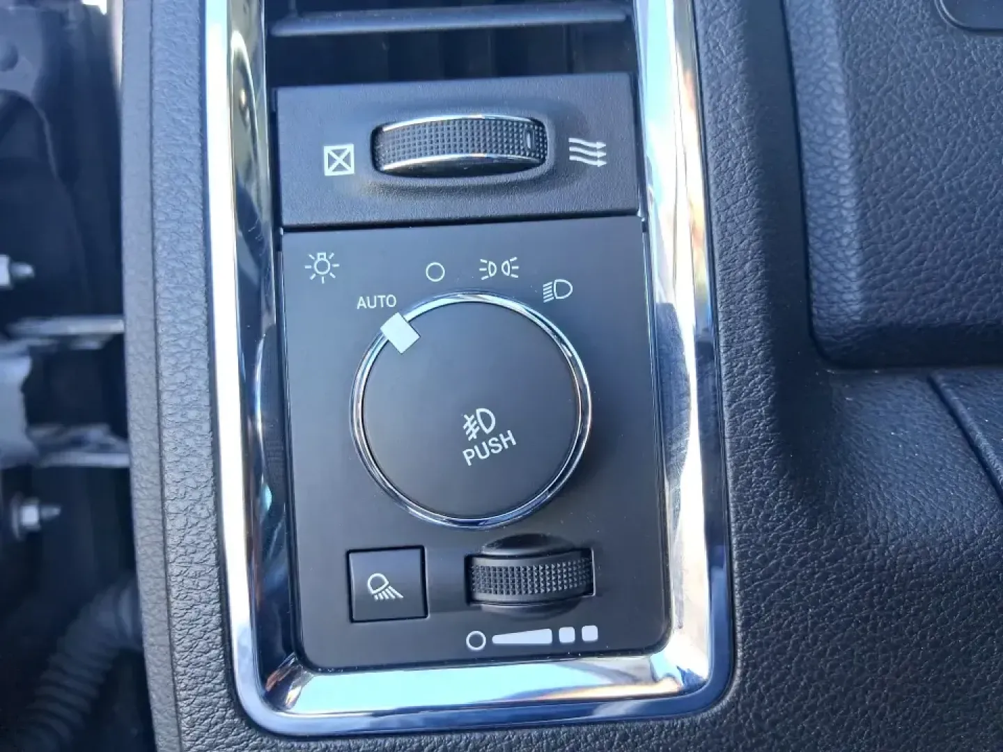 2016 Ram 1500 Laramie (1C6RR7NT1GS) with an 5.7L V8 OHV 16V engine, 6A transmission, located at 1951 S Dayton Lakeview Rd., New Carlisle, OH, 45344, (937) 908-9800, 39.890999, -84.050255 - Built for Ohio backroads, weekend lake runs, and the kind of workday that doesn't stop when the weather turns, this 2016 Ram 1500 Laramie Crew Cab 4WD is the truck that fits real life in Troy. Whether you're towing a trailer out toward the Miami County Fairgrounds, hauling gear for a Saturday at Tre - Photo#16
