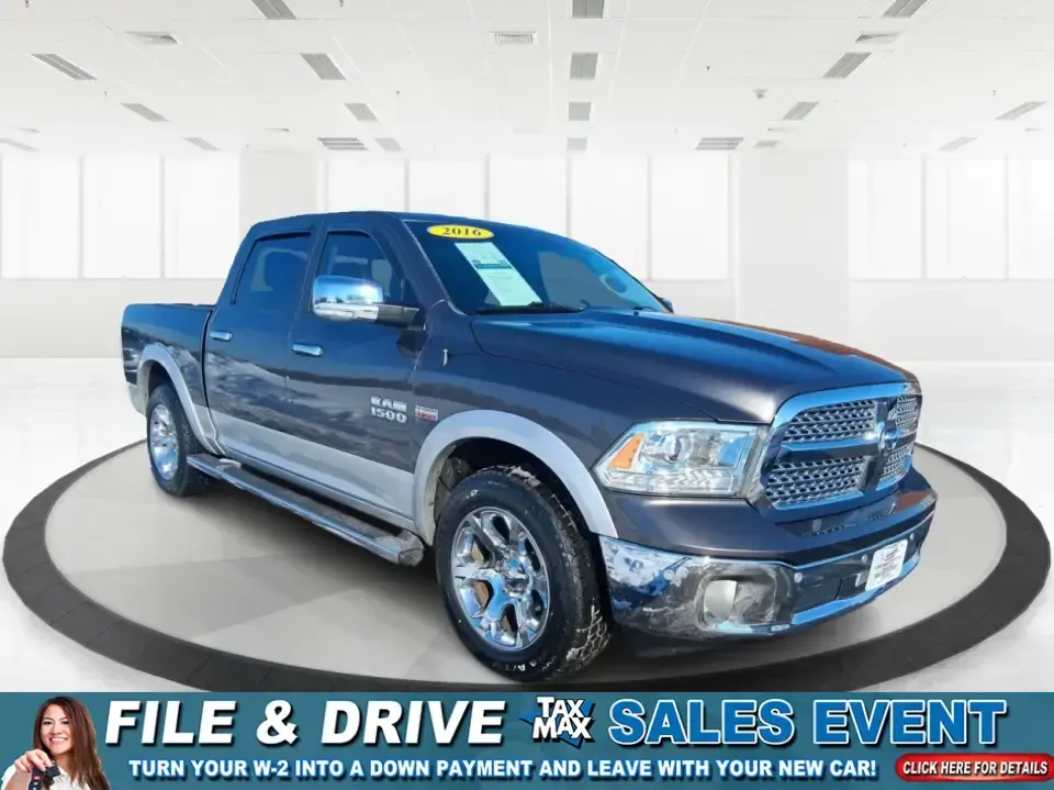 2016 Ram 1500 Laramie (1C6RR7NT1GS) with an 5.7L V8 OHV 16V engine, 6A transmission, located at 1184 Kauffman Ave, Fairborn, OH, 45324, (937) 908-9800, 39.807072, -84.030914 - 2016 Ram 1500 Laramie - Photo#0