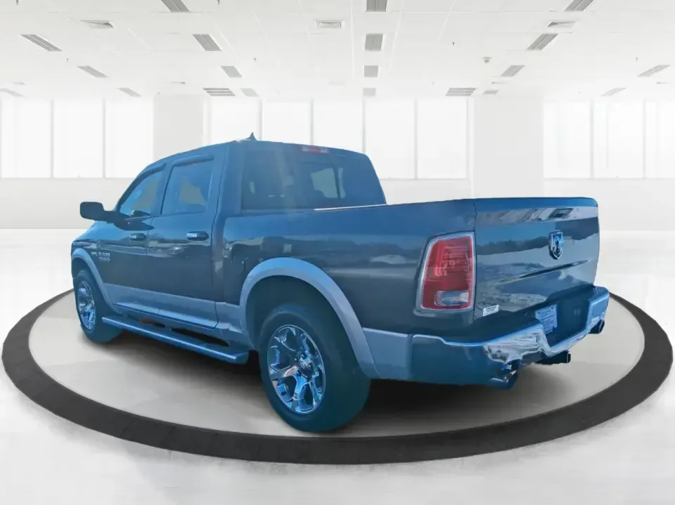 2016 Ram 1500 Laramie (1C6RR7NT1GS) with an 5.7L V8 OHV 16V engine, 6A transmission, located at 1184 Kauffman Ave, Fairborn, OH, 45324, (937) 908-9800, 39.807072, -84.030914 - 2016 Ram 1500 Laramie - Photo#4