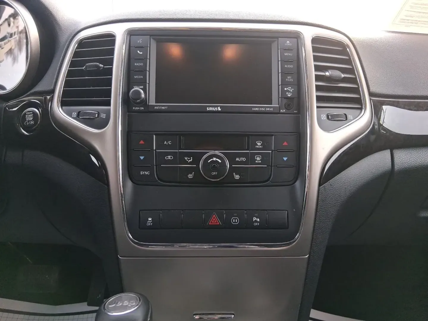 2012 Jeep Grand Cherokee Laredo (1C4RJFAG1CC) with an Other engine, located at 1099 N County Rd 25A , Troy, OH, 45373, (937) 908-9800, 40.057079, -84.212883 - Picture your next weekend escape: loading up the family, pointing the hood toward John A. Wannemacher Nature Reserve, and cruising I75 with confidence no matter what Ohio weather throws your way. This 2012 Jeep Grand Cherokee Laredo is built for real life in Troy-school runs, long commutes to Dayton - Photo#14