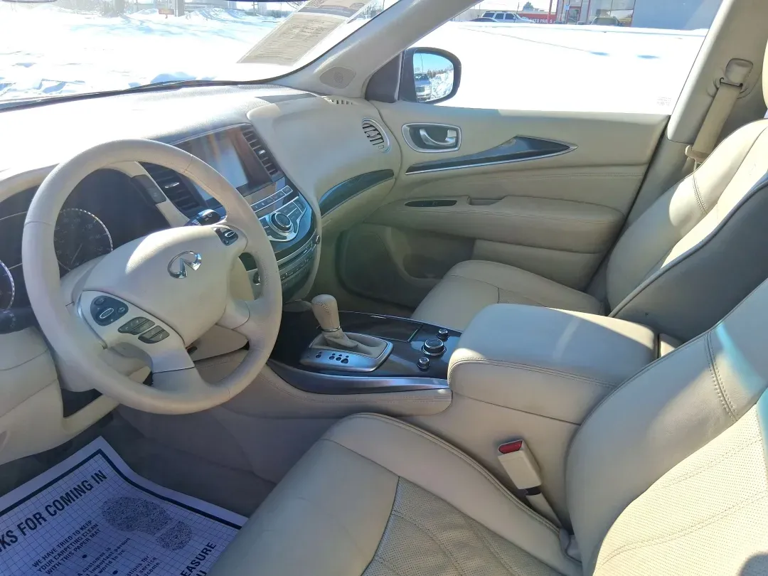 2013 Infiniti JX35 Base (5N1AL0MM9DC) with an 3.5L V6 DOHC 24V engine, Continuously Variable Transmission transmission, located at 1951 S Dayton Lakeview Rd., New Carlisle, OH, 45344, (937) 908-9800, 39.890999, -84.050255 - Need a comfortable, upscale SUV that can handle school drop-offs, I70 commutes, and weekend getaways without blowing the budget? This 2013 INFINITI JX35 Base in rich maroon delivers three-row versatility, premium comfort, and confidence-building safety features-an ideal fit for growing families, bus - Photo#7