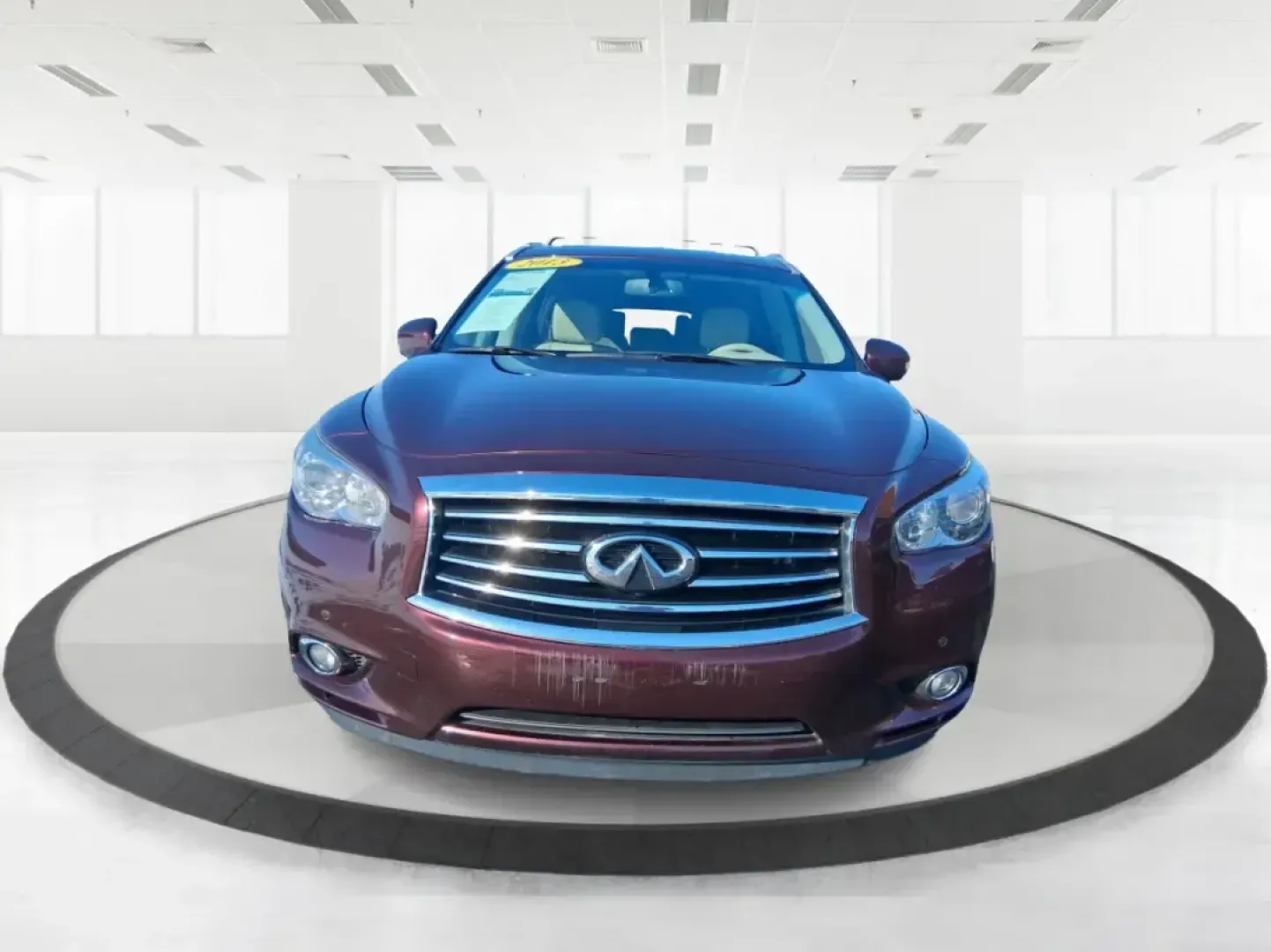 2013 Infiniti JX35 Base (5N1AL0MM9DC) with an 3.5L V6 DOHC 24V engine, Continuously Variable Transmission transmission, located at 1184 Kauffman Ave, Fairborn, OH, 45324, (937) 908-9800, 39.807072, -84.030914 - Need a comfortable, upscale SUV that can handle school drop-offs, I70 commutes, and weekend getaways without blowing the budget? This 2013 INFINITI JX35 Base in rich maroon delivers three-row versatility, premium comfort, and confidence-building safety features-an ideal fit for growing families, bus - Photo#4