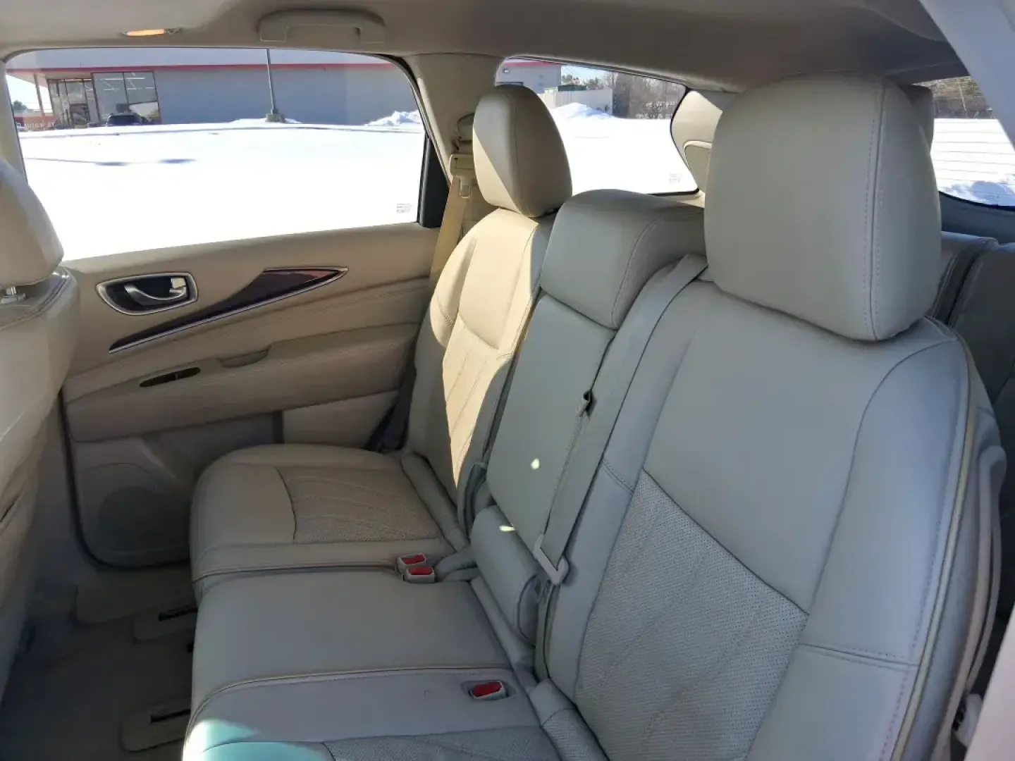 2013 Infiniti JX35 Base (5N1AL0MM9DC) with an 3.5L V6 DOHC 24V engine, Continuously Variable Transmission transmission, located at 1184 Kauffman Ave, Fairborn, OH, 45324, (937) 908-9800, 39.807072, -84.030914 - Need a comfortable, upscale SUV that can handle school drop-offs, I70 commutes, and weekend getaways without blowing the budget? This 2013 INFINITI JX35 Base in rich maroon delivers three-row versatility, premium comfort, and confidence-building safety features-an ideal fit for growing families, bus - Photo#8