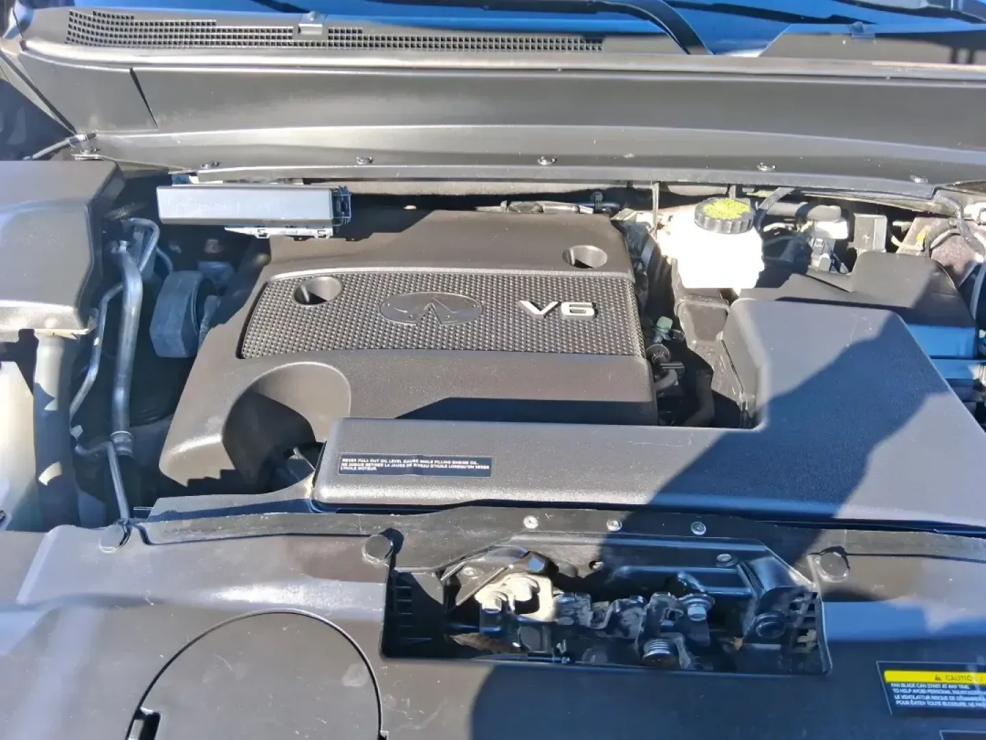 2013 Infiniti JX35 Base (5N1AL0MM9DC) with an 3.5L V6 DOHC 24V engine, Continuously Variable Transmission transmission, located at 1184 Kauffman Ave, Fairborn, OH, 45324, (937) 908-9800, 39.807072, -84.030914 - Need a comfortable, upscale SUV that can handle school drop-offs, I70 commutes, and weekend getaways without blowing the budget? This 2013 INFINITI JX35 Base in rich maroon delivers three-row versatility, premium comfort, and confidence-building safety features-an ideal fit for growing families, bus - Photo#9