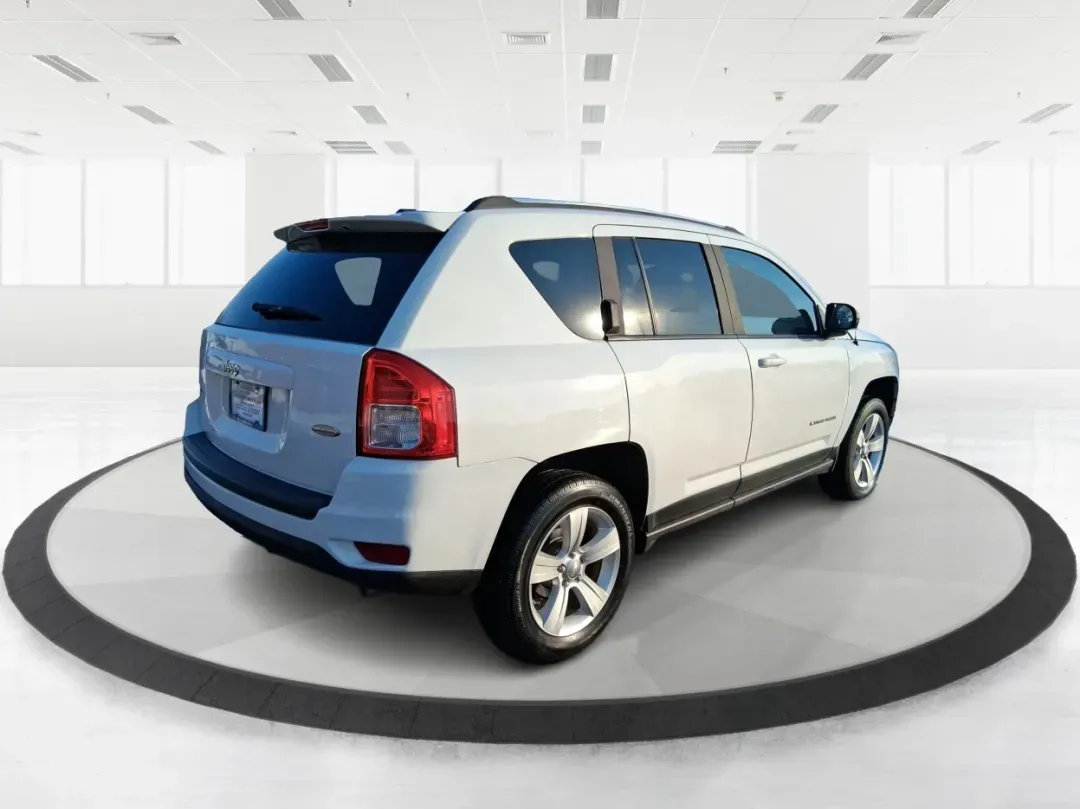 2012 Jeep Compass Latitude (1C4NJDEB4CD) with an 2.4L I-4 DOHC engine, Continuously Variable Transmission transmission, located at 8750 N County Rd 25A, Piqua, OH, 45356, (937) 908-9800, 40.164391, -84.232513 - Need a do-it-all SUV that fits real life in West Central Ohio-school drop-offs, long commutes up I75, and spontaneous weekend escapes to the trails around Johnston Farm and Indian Agency? This 2012 Jeep Compass Latitude 4WD in Bright White Clearcoat is built for that everyday adventure lifestyle, - Photo#2