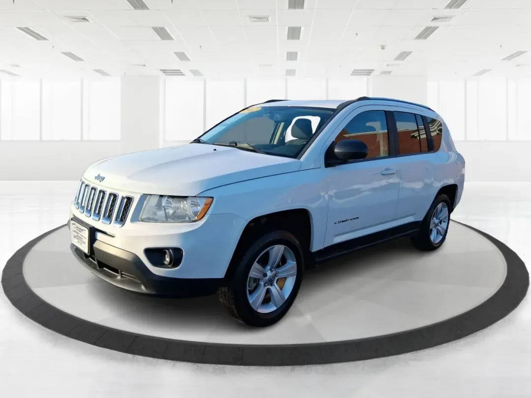 2012 Jeep Compass Latitude (1C4NJDEB4CD) with an 2.4L I-4 DOHC engine, Continuously Variable Transmission transmission, located at 8750 N County Rd 25A, Piqua, OH, 45356, (937) 908-9800, 40.164391, -84.232513 - Need a do-it-all SUV that fits real life in West Central Ohio-school drop-offs, long commutes up I75, and spontaneous weekend escapes to the trails around Johnston Farm and Indian Agency? This 2012 Jeep Compass Latitude 4WD in Bright White Clearcoat is built for that everyday adventure lifestyle, - Photo#7
