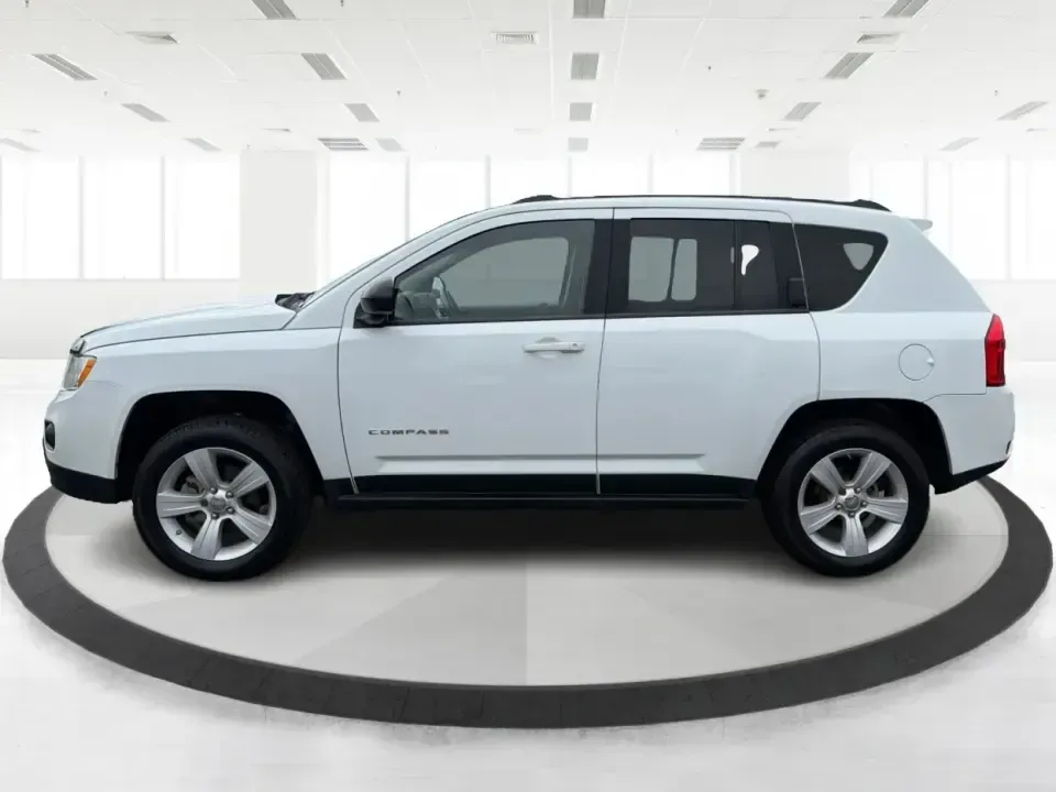 2012 Jeep Compass Latitude (1C4NJDEB4CD) with an 2.4L I-4 DOHC engine, Continuously Variable Transmission transmission, located at 1230 East Main St, Xenia, OH, 45385, (937) 908-9800, 39.688026, -83.910172 - Need a do-it-all SUV that fits real life in West Central Ohio-school drop-offs, long commutes up I75, and spontaneous weekend escapes to the trails around Johnston Farm and Indian Agency? This 2012 Jeep Compass Latitude 4WD in Bright White Clearcoat is built for that everyday adventure lifestyle, - Photo#5