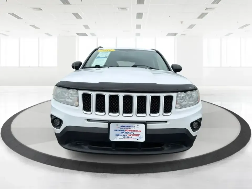 2012 Jeep Compass Latitude (1C4NJDEB4CD) with an 2.4L I-4 DOHC engine, Continuously Variable Transmission transmission, located at 1230 East Main St, Xenia, OH, 45385, (937) 908-9800, 39.688026, -83.910172 - Need a do-it-all SUV that fits real life in West Central Ohio-school drop-offs, long commutes up I75, and spontaneous weekend escapes to the trails around Johnston Farm and Indian Agency? This 2012 Jeep Compass Latitude 4WD in Bright White Clearcoat is built for that everyday adventure lifestyle, - Photo#7