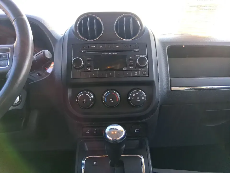 2012 Jeep Compass Latitude (1C4NJDEB4CD) with an 2.4L I-4 DOHC engine, Continuously Variable Transmission transmission, located at 1230 East Main St, Xenia, OH, 45385, (937) 908-9800, 39.688026, -83.910172 - Need a do-it-all SUV that fits real life in West Central Ohio-school drop-offs, long commutes up I75, and spontaneous weekend escapes to the trails around Johnston Farm and Indian Agency? This 2012 Jeep Compass Latitude 4WD in Bright White Clearcoat is built for that everyday adventure lifestyle, - Photo#13
