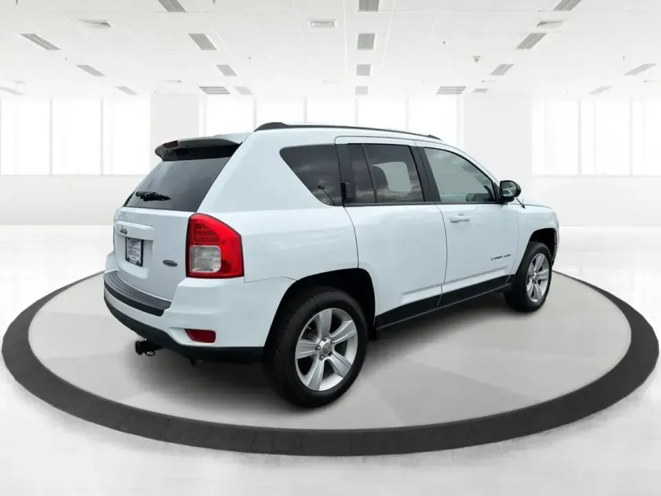 2012 Jeep Compass Latitude (1C4NJDEB4CD) with an 2.4L I-4 DOHC engine, Continuously Variable Transmission transmission, located at 1184 Kauffman Ave, Fairborn, OH, 45324, (937) 908-9800, 39.807072, -84.030914 - Need a do-it-all SUV that fits real life in West Central Ohio-school drop-offs, long commutes up I75, and spontaneous weekend escapes to the trails around Johnston Farm and Indian Agency? This 2012 Jeep Compass Latitude 4WD in Bright White Clearcoat is built for that everyday adventure lifestyle, - Photo#2