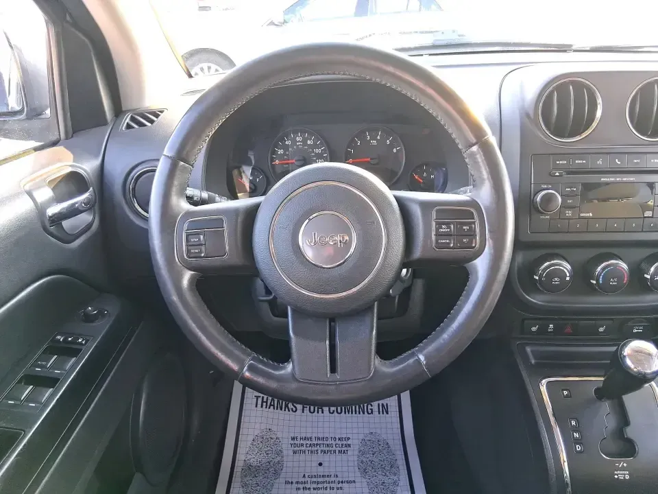 2012 Jeep Compass Latitude (1C4NJDEB4CD) with an 2.4L I-4 DOHC engine, Continuously Variable Transmission transmission, located at 1184 Kauffman Ave, Fairborn, OH, 45324, (937) 908-9800, 39.807072, -84.030914 - Need a do-it-all SUV that fits real life in West Central Ohio-school drop-offs, long commutes up I75, and spontaneous weekend escapes to the trails around Johnston Farm and Indian Agency? This 2012 Jeep Compass Latitude 4WD in Bright White Clearcoat is built for that everyday adventure lifestyle, - Photo#16