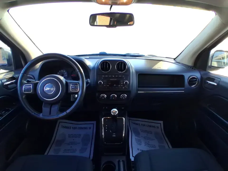 2012 Jeep Compass Latitude (1C4NJDEB4CD) with an 2.4L I-4 DOHC engine, Continuously Variable Transmission transmission, located at 1184 Kauffman Ave, Fairborn, OH, 45324, (937) 908-9800, 39.807072, -84.030914 - Need a do-it-all SUV that fits real life in West Central Ohio-school drop-offs, long commutes up I75, and spontaneous weekend escapes to the trails around Johnston Farm and Indian Agency? This 2012 Jeep Compass Latitude 4WD in Bright White Clearcoat is built for that everyday adventure lifestyle, - Photo#19