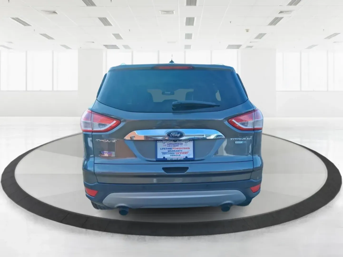 2016 Ford Escape Titanium (1FMCU9J94GU) with an 2.0L L4 DOHC 16V engine, 6-Speed Automatic transmission, located at 1951 S Dayton Lakeview Rd., New Carlisle, OH, 45344, (937) 908-9800, 39.890999, -84.050255 - Picture your next Ohio weekend: a quick grocery run through New Carlisle, a comfortable commute toward Dayton, and then a spontaneous road trip out I70 with the family-without worrying about weather, cargo space, or comfort. This 2016 Ford Escape Titanium in sleek Magnetic is the kind of compact SUV - Photo#3