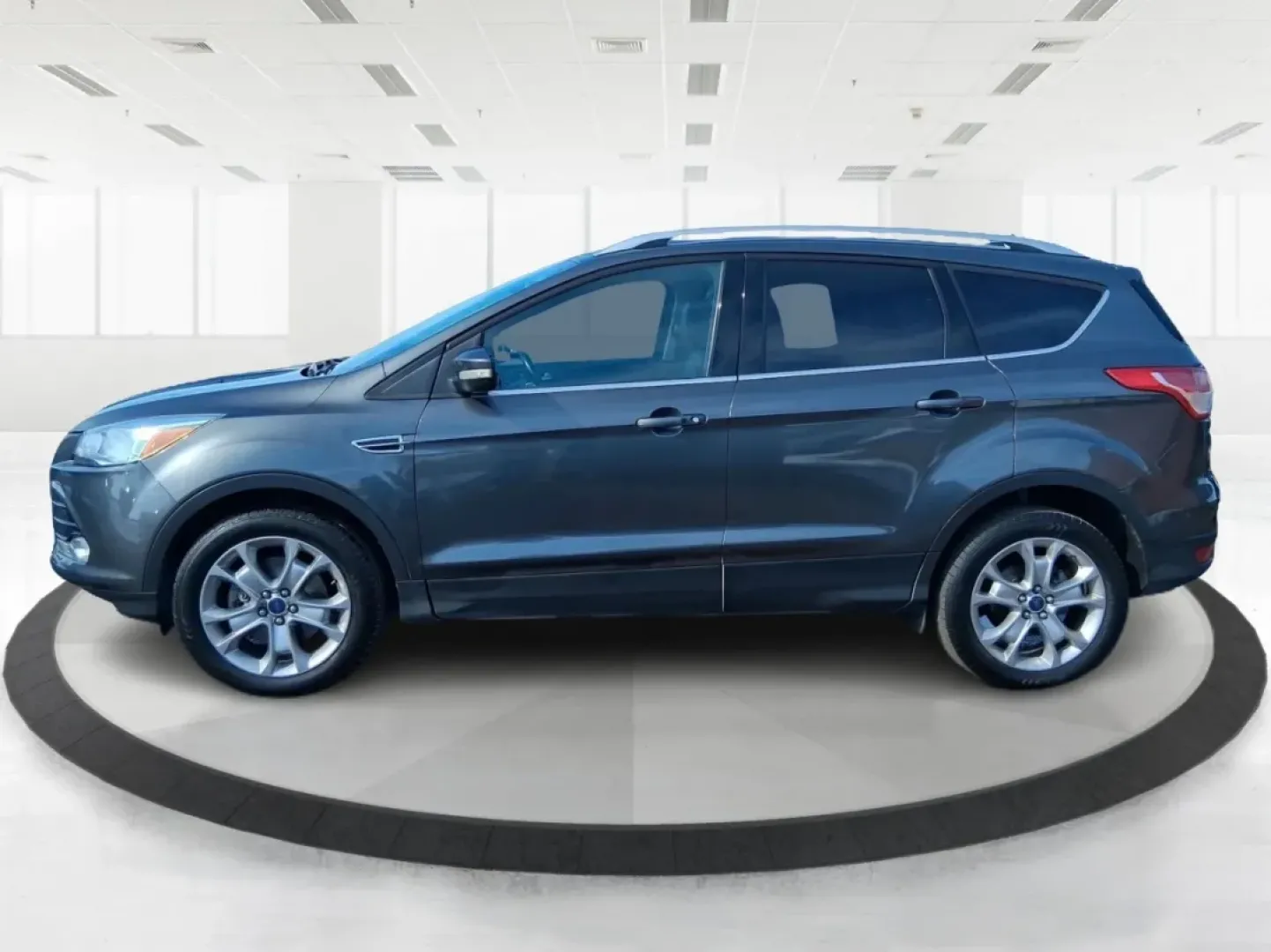 2016 Ford Escape Titanium (1FMCU9J94GU) with an 2.0L L4 DOHC 16V engine, 6-Speed Automatic transmission, located at 1951 S Dayton Lakeview Rd., New Carlisle, OH, 45344, (937) 908-9800, 39.890999, -84.050255 - Picture your next Ohio weekend: a quick grocery run through New Carlisle, a comfortable commute toward Dayton, and then a spontaneous road trip out I70 with the family-without worrying about weather, cargo space, or comfort. This 2016 Ford Escape Titanium in sleek Magnetic is the kind of compact SUV - Photo#5