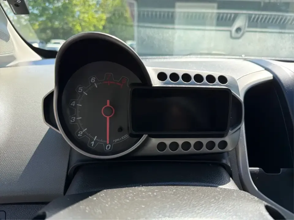 2016 Chevrolet Sonic LS Auto 5-Door (1G1JA6SH4G4) with an 1.8L L4 DOHC 24V engine, 6A transmission, located at 1230 East Main St, Xenia, OH, 45385, (937) 908-9800, 39.688026, -83.910172 - Need a smart, budget-friendly commuter that's also ready for weekend errands, downtown parking, and quick road trips to Yellow Springs? This 2016 Chevrolet Sonic LS Auto Hatchback in Summit White fits real-life driving in and around Xenia, Ohio-easy to maneuver, efficient to run, and versatile enoug - Photo#15