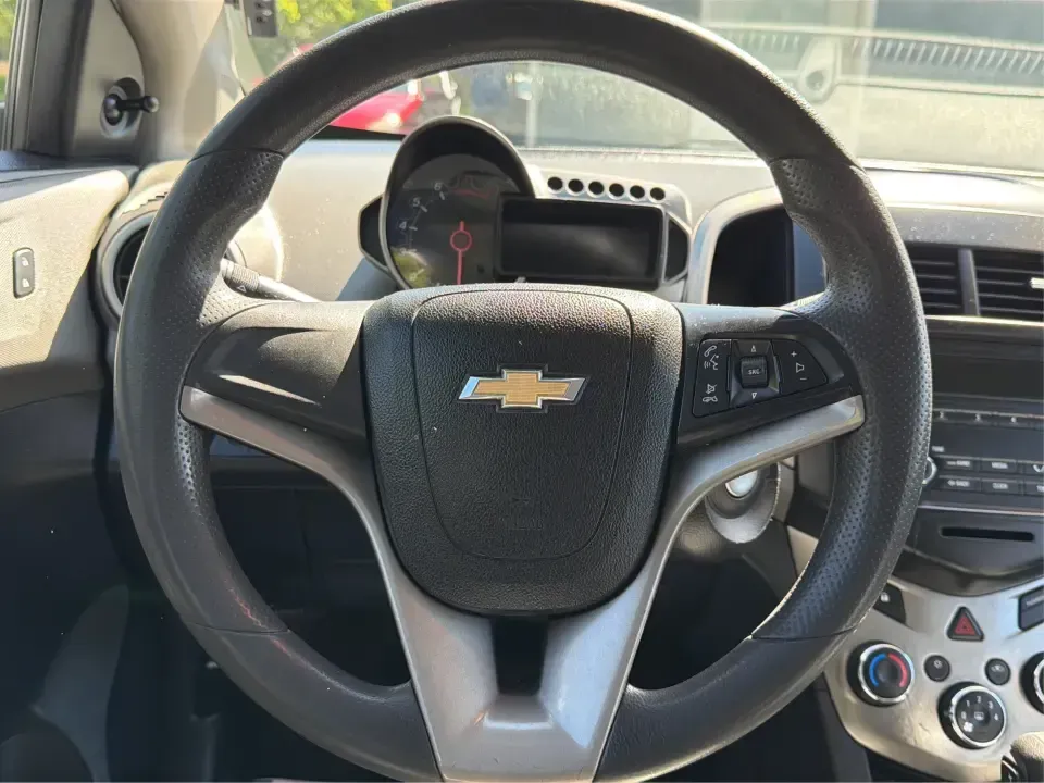 2016 Chevrolet Sonic LS Auto 5-Door (1G1JA6SH4G4) with an 1.8L L4 DOHC 24V engine, 6A transmission, located at 1230 East Main St, Xenia, OH, 45385, (937) 908-9800, 39.688026, -83.910172 - Need a smart, budget-friendly commuter that's also ready for weekend errands, downtown parking, and quick road trips to Yellow Springs? This 2016 Chevrolet Sonic LS Auto Hatchback in Summit White fits real-life driving in and around Xenia, Ohio-easy to maneuver, efficient to run, and versatile enoug - Photo#16