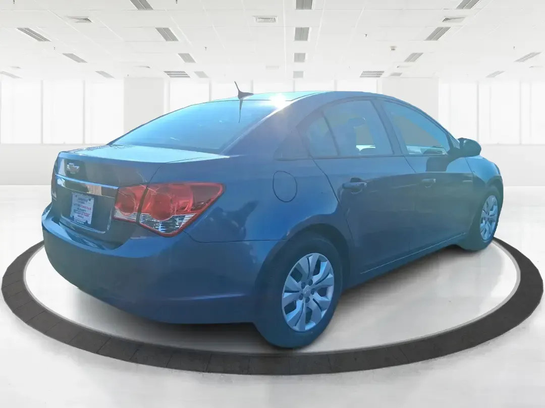 2014 Chevrolet Cruze LS Auto (1G1PA5SH3E7) with an ECOTEC 1.8L I-4 DOHC engine, 6-Speed Automatic transmission, located at 1951 S Dayton Lakeview Rd., New Carlisle, OH, 45344, (937) 908-9800, 39.890999, -84.050255 - Need a smart, budget-friendly commuter that can handle daily school drop-offs, I-75 traffic, and weekend errands without draining your wallet at the pump? This 2014 Chevrolet Cruze LS Auto is a practical, easy-to-live-with sedan that fits real Moraine lifestyles-whether you're commuting toward Downt - Photo#2