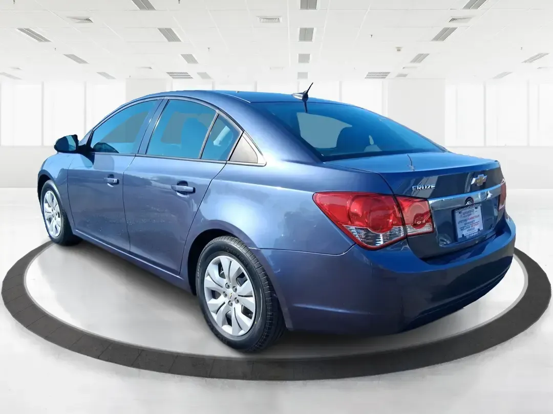 2014 Chevrolet Cruze LS Auto (1G1PA5SH3E7) with an ECOTEC 1.8L I-4 DOHC engine, 6-Speed Automatic transmission, located at 1951 S Dayton Lakeview Rd., New Carlisle, OH, 45344, (937) 908-9800, 39.890999, -84.050255 - Need a smart, budget-friendly commuter that can handle daily school drop-offs, I-75 traffic, and weekend errands without draining your wallet at the pump? This 2014 Chevrolet Cruze LS Auto is a practical, easy-to-live-with sedan that fits real Moraine lifestyles-whether you're commuting toward Downt - Photo#4