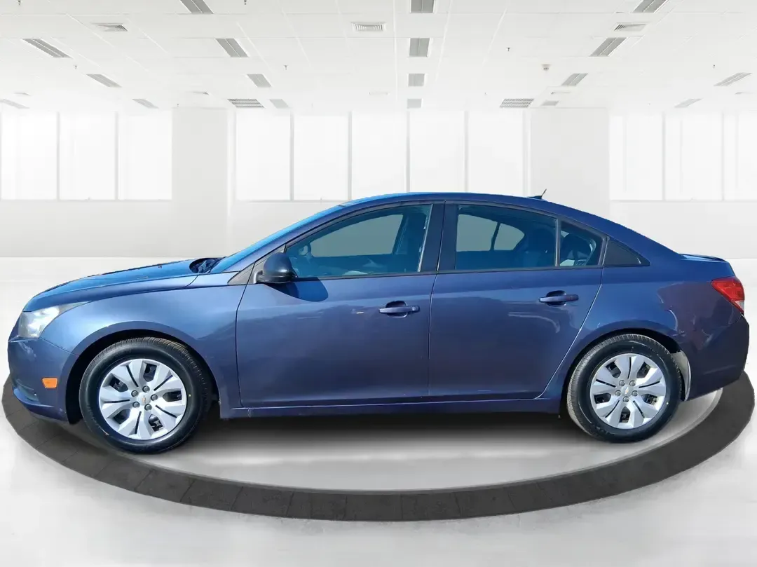 2014 Chevrolet Cruze LS Auto (1G1PA5SH3E7) with an ECOTEC 1.8L I-4 DOHC engine, 6-Speed Automatic transmission, located at 1951 S Dayton Lakeview Rd., New Carlisle, OH, 45344, (937) 908-9800, 39.890999, -84.050255 - Need a smart, budget-friendly commuter that can handle daily school drop-offs, I-75 traffic, and weekend errands without draining your wallet at the pump? This 2014 Chevrolet Cruze LS Auto is a practical, easy-to-live-with sedan that fits real Moraine lifestyles-whether you're commuting toward Downt - Photo#5