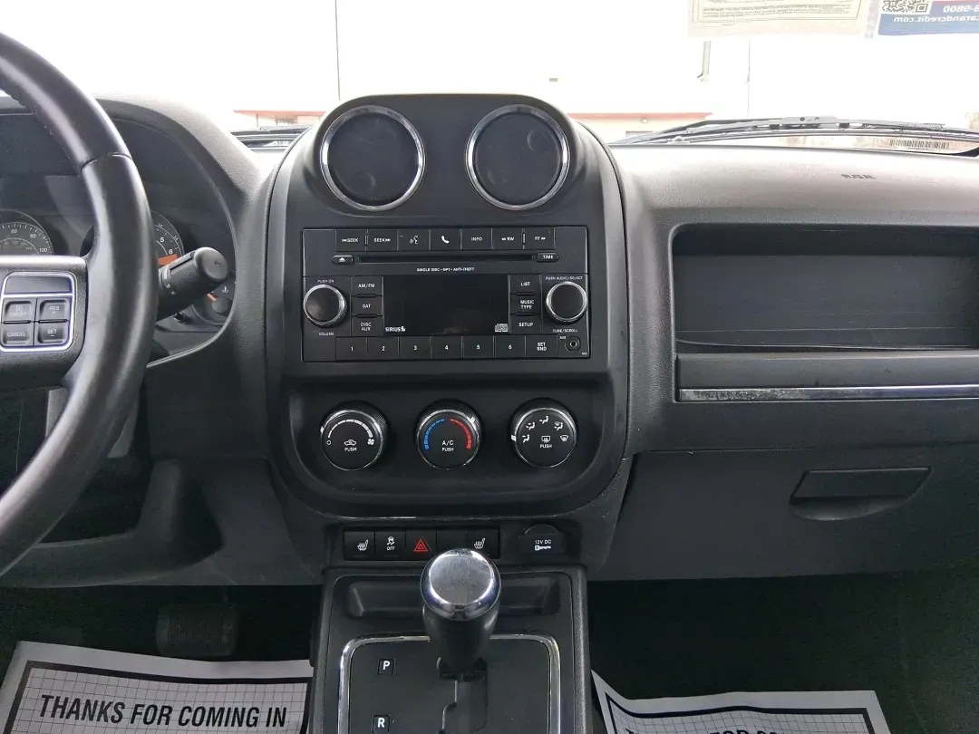 2016 Jeep Patriot Latitude (1C4NJPFA8GD) with an 2.0L L4 DOHC 16V engine, located at 1951 S Dayton Lakeview Rd., New Carlisle, OH, 45344, (937) 908-9800, 39.890999, -84.050255 - Picture your next weekend escape: loading up the gear, pointing the hood toward John Bryan State Park or a day trip to Dayton, and enjoying the confident, go-anywhere feel that makes a Jeep a Jeep. This **2016 Jeep Patriot Latitude** is a smart fit for commuters, first-time buyers, and budget-consci - Photo#13