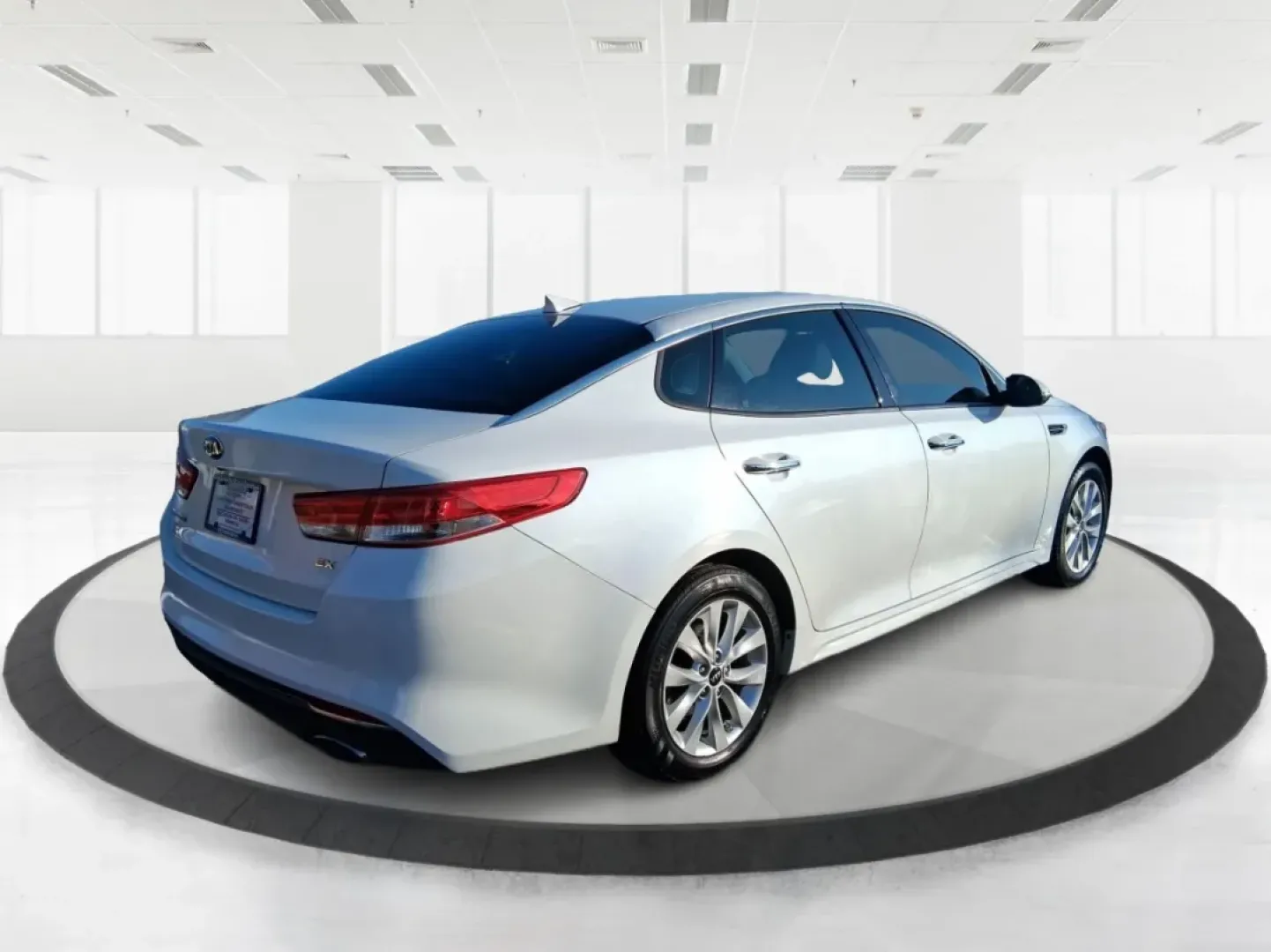 2016 Kia Optima EX (5XXGU4L31GG) with an Theta II 2.4L I-4 gasoline direct injection engine, 6A transmission, located at 880 E. National Road, Vandalia, OH, 45377, (937) 908-9800, 39.891918, -84.183594 - Whether you're a busy commuter heading down I75, a rideshare driver stacking miles, or a small family looking for a comfortable sedan for school runs and weekend errands, this 2016 Kia Optima EX is built for real-life driving in and around Vandalia, Ohio. Finished in Snow White Pearl, it delivers th - Photo#2