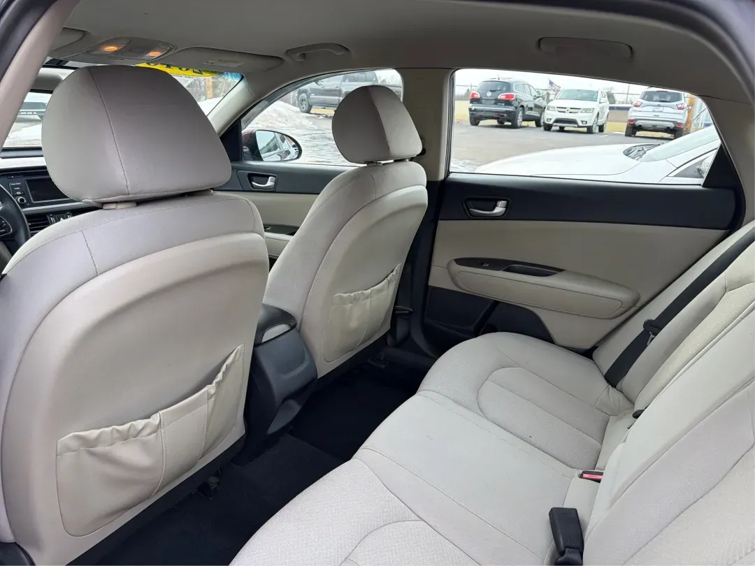 2016 Kia Optima LX (5XXGT4L32GG) with an Theta II 2.4L I-4 gasoline direct injection engine, 6A transmission, located at 1184 Kauffman Ave, Fairborn, OH, 45324, (937) 908-9800, 39.807072, -84.030914 - Picture your next week going smoother: an easy morning commute down I-675, a quick run to The Mall at Fairfield Commons, and a comfortable weekend drive past Wright State University or out toward the National Museum of the U.S. Air Force-without stressing about your budget. This 2016 Kia Optima LX s - Photo#10