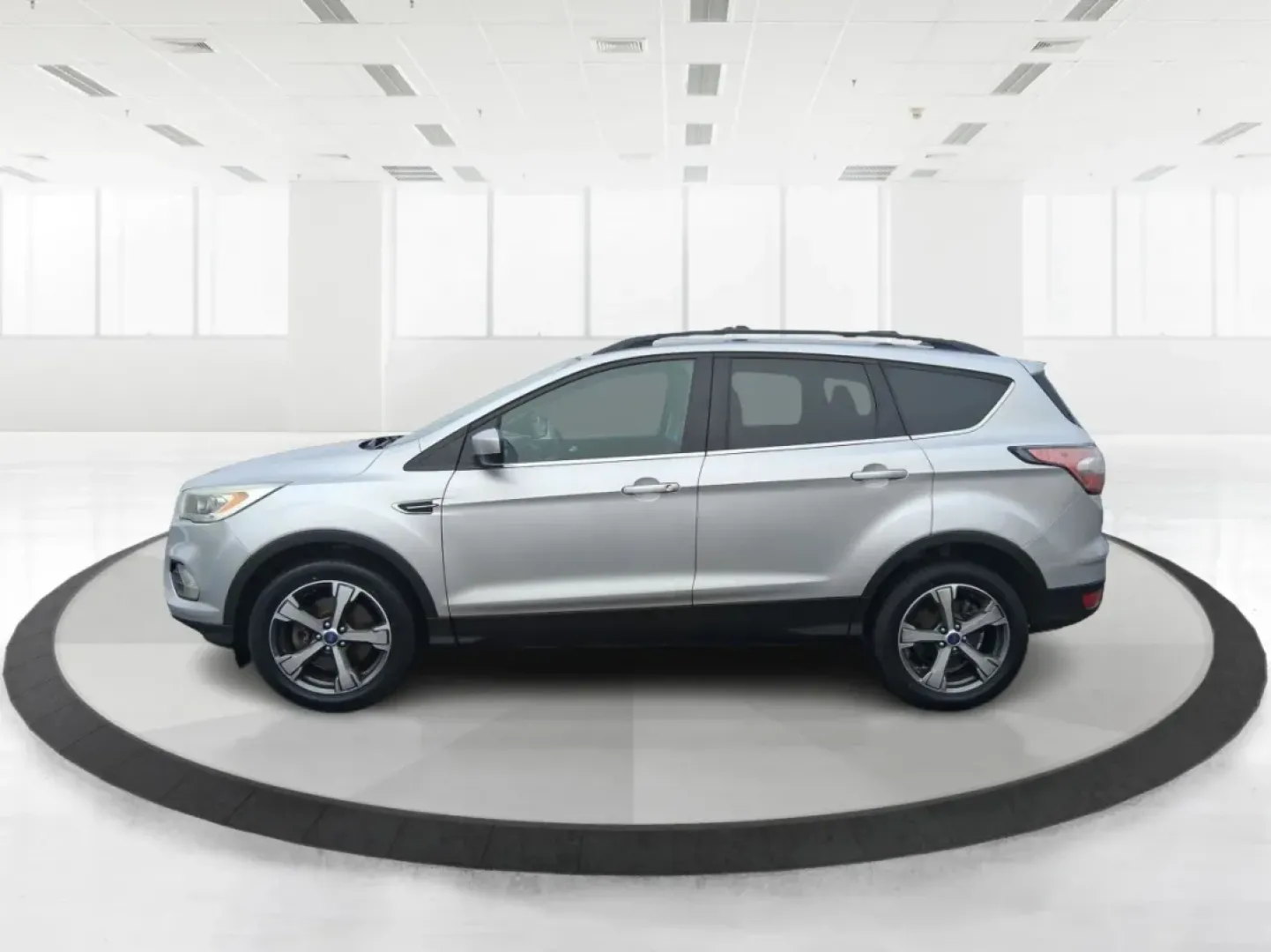 2017 Ford Escape SE (1FMCU0GD5HU) with an 1.5L L4 DOHC 16V engine, 6A transmission, located at 1099 N County Rd 25A , Troy, OH, 45373, (937) 908-9800, 40.057079, -84.212883 - Picture your next Ohio weekend: a quick run up I75 for errands, a family day at Treasure Island Park, or a spontaneous road trip to Dayton-without worrying about space, comfort, or winter-ready confidence. This 2017 Ford Escape SE SUV is built for real life in Troy, offering the easy maneuverability - Photo#5