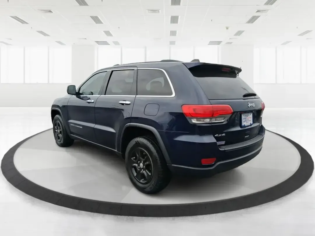 2015 Jeep Grand Cherokee Laredo (1C4RJFAG1FC) with an 3.6L V-6 DOHC engine, 8-Speed Automatic transmission, located at 1951 S Dayton Lakeview Rd., New Carlisle, OH, 45344, (937) 908-9800, 39.890999, -84.050255 - Picture a weekend that starts with a smooth commute through Clark County and ends with a spontaneous road trip-camp gear in the back, friends in the second row, and confidence when the weather turns. This 2015 Jeep Grand Cherokee Laredo is built for real life in Ohio: school runs, long drives down I - Photo#4