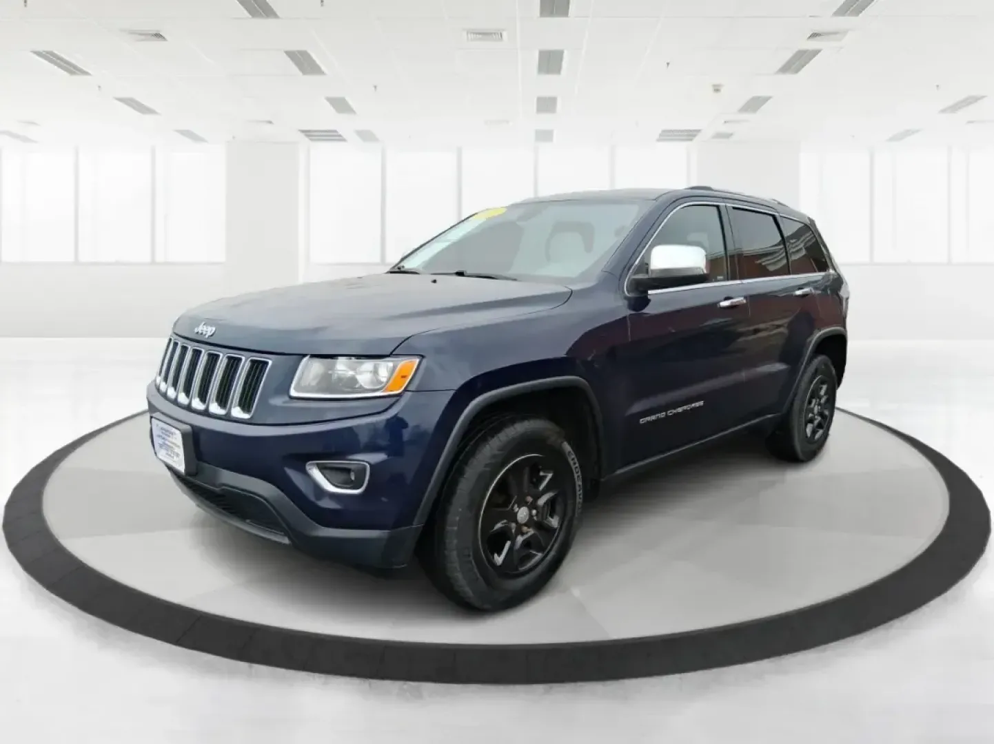 2015 Jeep Grand Cherokee Laredo (1C4RJFAG1FC) with an 3.6L V-6 DOHC engine, 8-Speed Automatic transmission, located at 1951 S Dayton Lakeview Rd., New Carlisle, OH, 45344, (937) 908-9800, 39.890999, -84.050255 - Picture a weekend that starts with a smooth commute through Clark County and ends with a spontaneous road trip-camp gear in the back, friends in the second row, and confidence when the weather turns. This 2015 Jeep Grand Cherokee Laredo is built for real life in Ohio: school runs, long drives down I - Photo#8