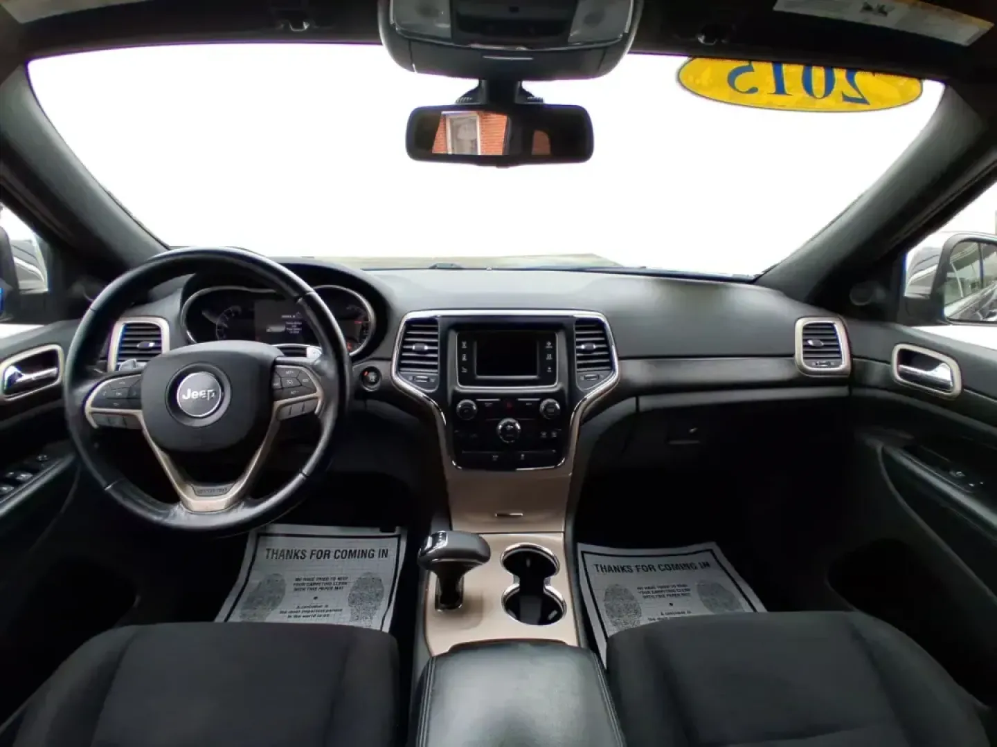 2015 Jeep Grand Cherokee Laredo (1C4RJFAG1FC) with an 3.6L V-6 DOHC engine, 8-Speed Automatic transmission, located at 1951 S Dayton Lakeview Rd., New Carlisle, OH, 45344, (937) 908-9800, 39.890999, -84.050255 - Picture a weekend that starts with a smooth commute through Clark County and ends with a spontaneous road trip-camp gear in the back, friends in the second row, and confidence when the weather turns. This 2015 Jeep Grand Cherokee Laredo is built for real life in Ohio: school runs, long drives down I - Photo#21