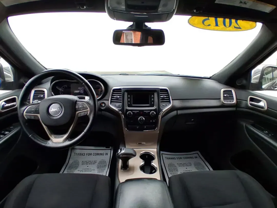 2015 Jeep Grand Cherokee Laredo (1C4RJFAG1FC) with an 3.6L V-6 DOHC engine, 8-Speed Automatic transmission, located at 1951 S Dayton Lakeview Rd., New Carlisle, OH, 45344, (937) 908-9800, 39.890999, -84.050255 - Picture a weekend that starts with a smooth commute through Clark County and ends with a spontaneous road trip-camp gear in the back, friends in the second row, and confidence when the weather turns. This 2015 Jeep Grand Cherokee Laredo is built for real life in Ohio: school runs, long drives down I - Photo#21