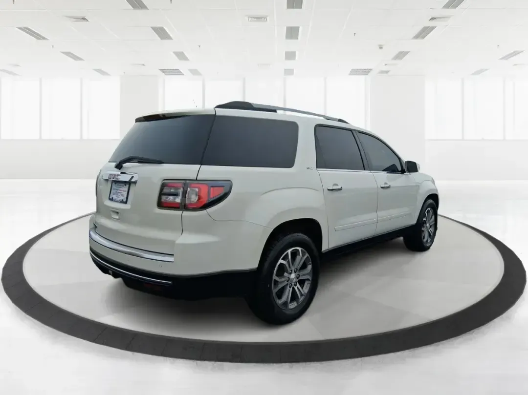 2015 GMC Acadia SLT-1 (1GKKRRKDXFJ) with an 3.6L V-6 gasoline direct injection engine, 6-Speed Automatic transmission, located at 4508 South Dixie Dr, Moraine, OH, 45439, (937) 908-9800, 39.689976, -84.218452 - Need one SUV that can handle school drop-offs, a long commute up I75, and a packed weekend at Carillon Historical Park or a day trip to Caesar Creek? This 2015 GMC Acadia SLT-1 is built for real life in Moraine-roomy, comfortable, and ready for the daily hustle while still feeling upscale for road-t - Photo#2