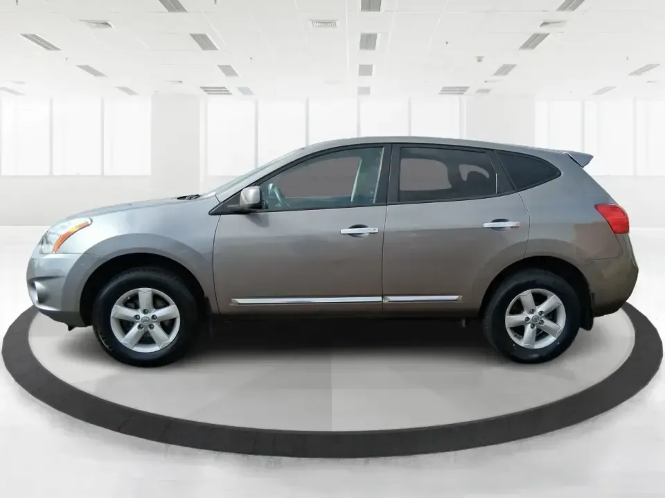 2013 Nissan Rogue S (JN8AS5MV5DW) with an 2.5L I-4 DOHC engine, Continuously Variable Transmission transmission, located at 8750 N County Rd 25A, Piqua, OH, 45356, (937) 908-9800, 40.164391, -84.232513 - Ready for a practical SUV that fits real life in the Miami Valley-school drop-offs, I-75 commutes, grocery runs, and spontaneous weekend getaways to Carillon Historical Park or a stroll around The Greene? This **2013 Nissan Rogue S** is the kind of compact SUV that makes everyday driving easier, wit - Photo#5