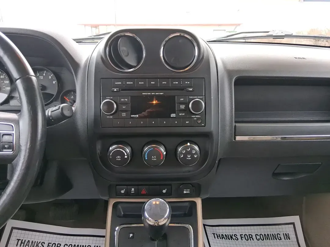 2012 Jeep Patriot Latitude (1C4NJPFB0CD) with an 2.4L L4 DOHC 16V engine, located at 1099 N County Rd 25A , Troy, OH, 45373, (937) 908-9800, 40.057079, -84.212883 - Picture your next weekend: a quick run up I-75 for a family visit, a scenic drive past the Miami River, then an easy loop back through downtown Troy for dinner-without worrying about whether your SUV can keep up with daily life. This 2012 Jeep Patriot Latitude is built for practical adventures and e - Photo#13